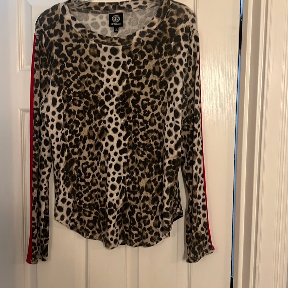 Like new! Large animal print top with red stripe on sleeves